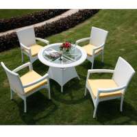 white rattan  garden dining table and chair set